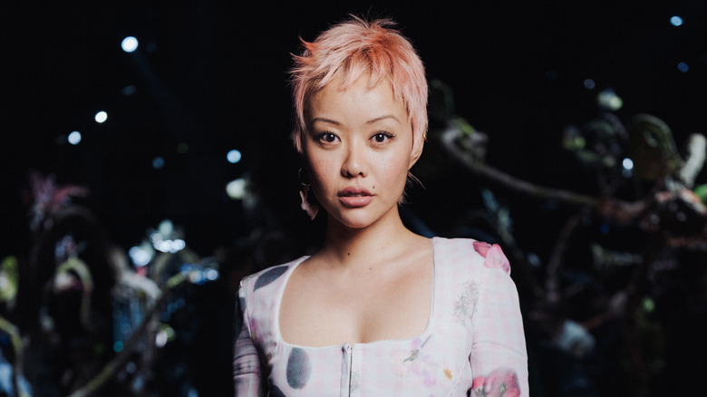 woman with pink pixie haircut style