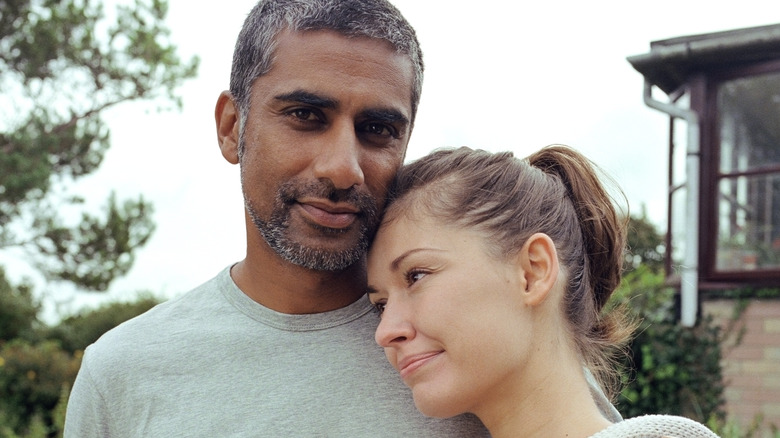 Woman leaning on a man