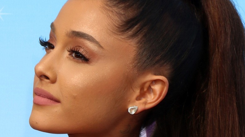 Ariana Grande with ponytail and diamond earring