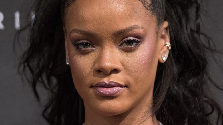Rihanna wearing purple blush 