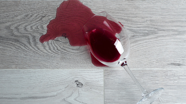 Spilled glass of red wine