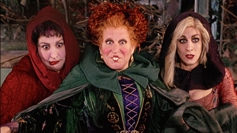Hocus Pocus witches standing in front of the bus