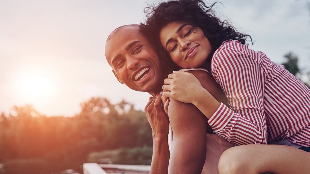 Couple embracing each other lovingly 