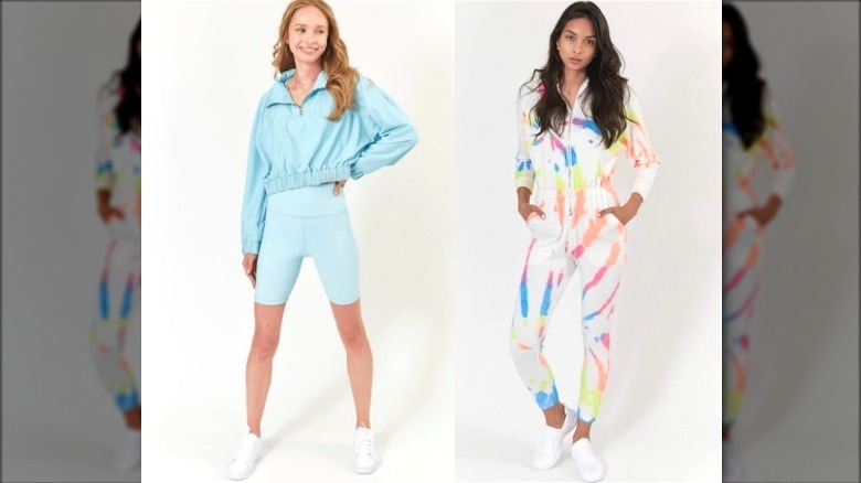 Models wearing blue bike shorts and white tie dyed jumpsuit