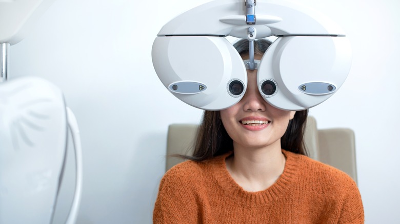 Woman getting an eye exam