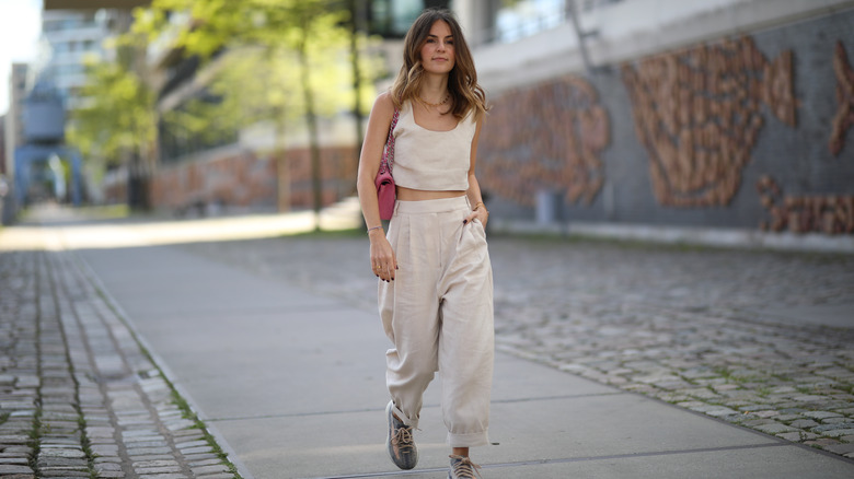 Woman walking on city street