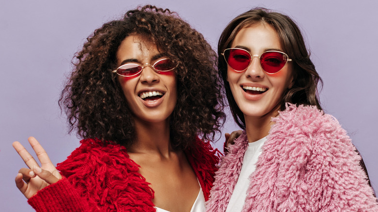 Models wearing red and pink sherpas