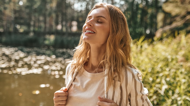 A woman enjoying nature. 