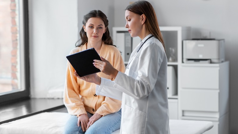 woman speaking with her doctor