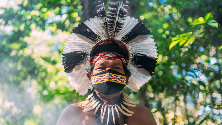 shaman during ceremony in headdress