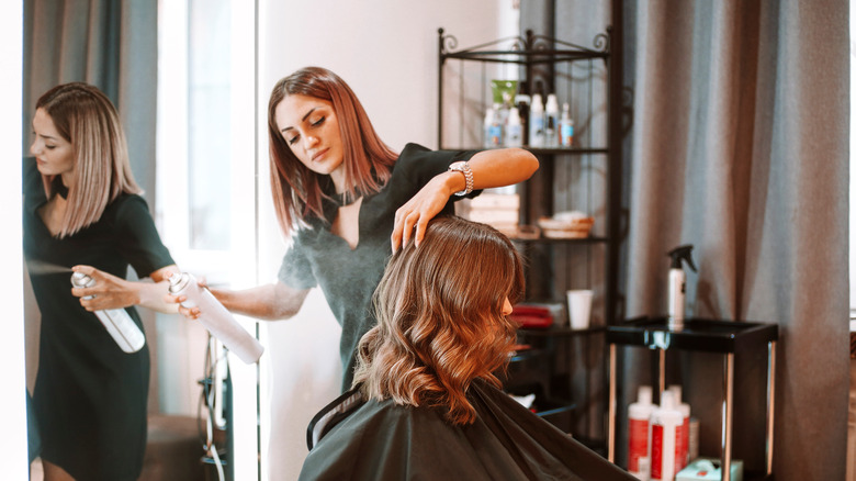 woman getting a haircut