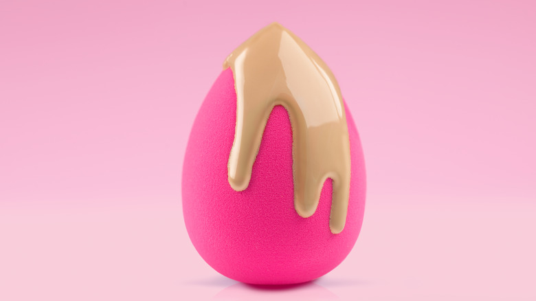 Pink beauty blender with foundation