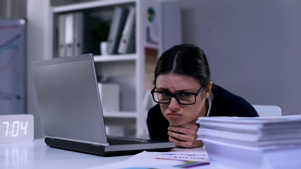 woman looking miserable