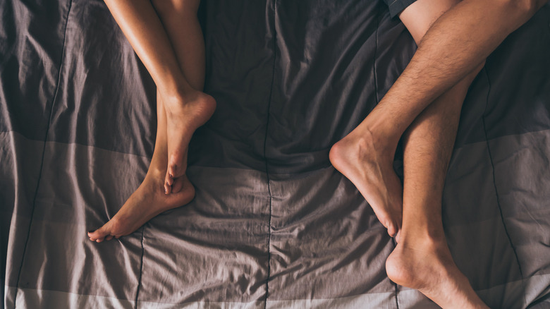 Couple sleeping apart