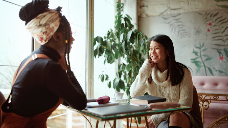 Women chatting over coffee