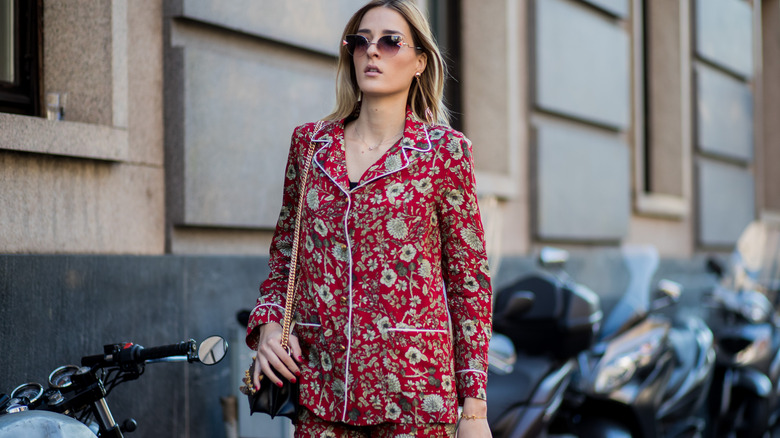 woman walking outside in stylish PJs