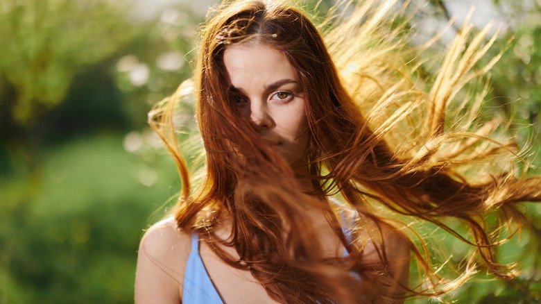 Woman with long blowing hair