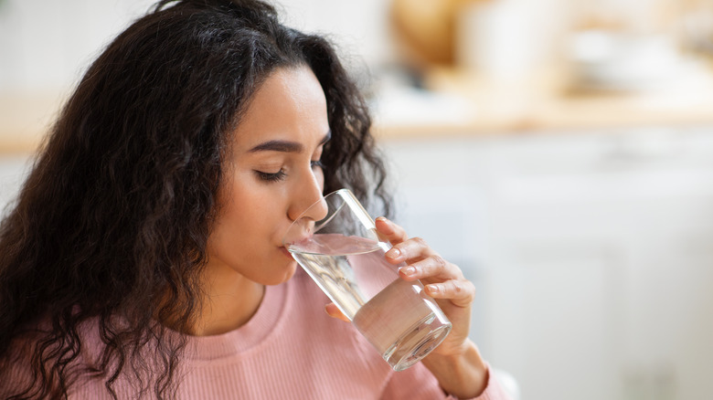 Woman drinking a glass of water