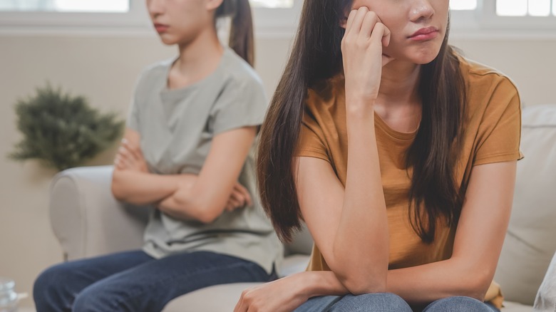 two women looking upset breakup