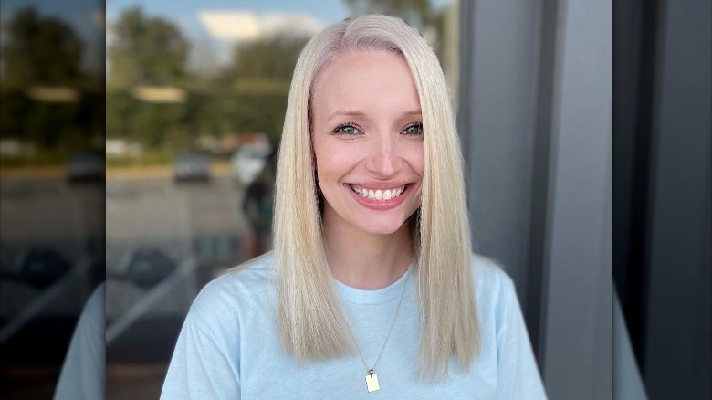 Woman with monochrome blonde hair