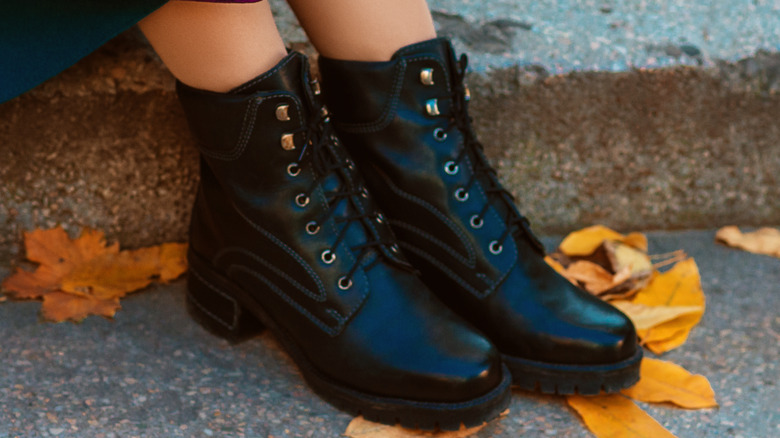 Woman wearing chunky boots in autumn