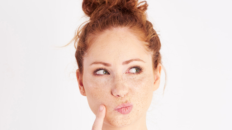 Woman with messy bun