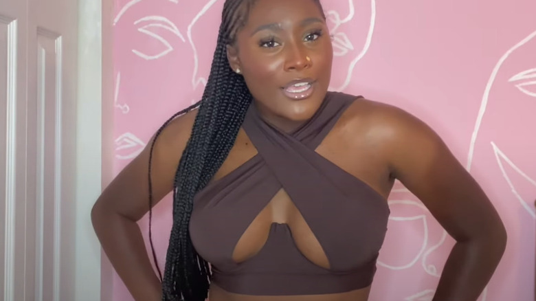 Woman posing criss-cross crop top