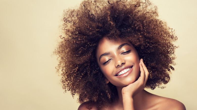 woman with big curly hair