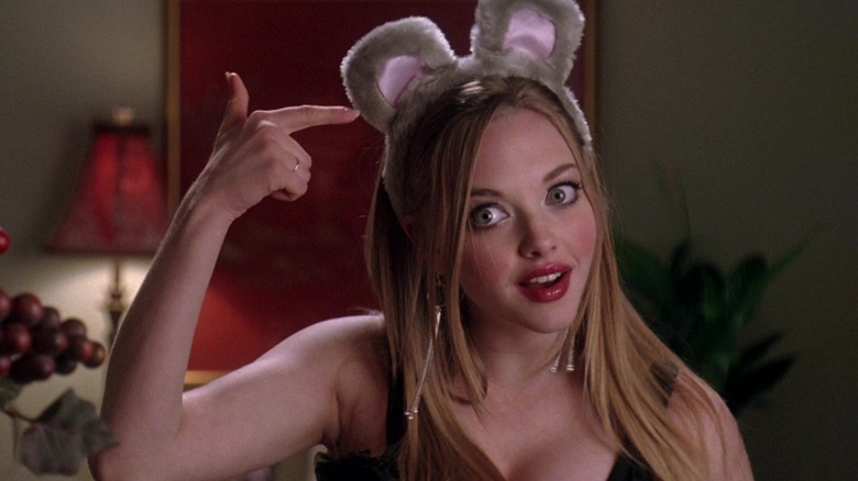 Amanda Seyfried in character as Karen from Mean Girls showing off her Halloween costume