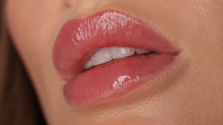 woman glossy lips