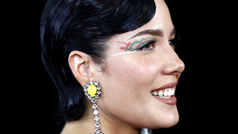 Halsey showcasing a unique makeup look at an event