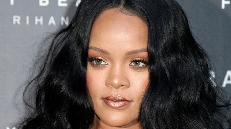 Rihanna close up with gold makeup 