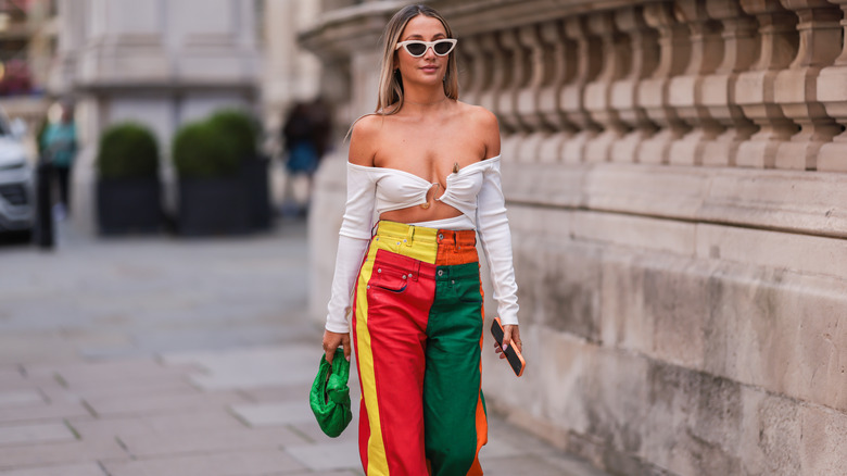 woman wearing colorblocked jeans