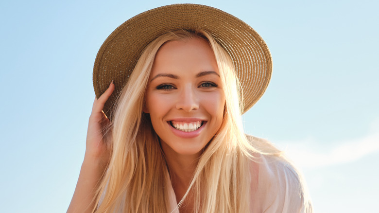 Woman smiling at beach