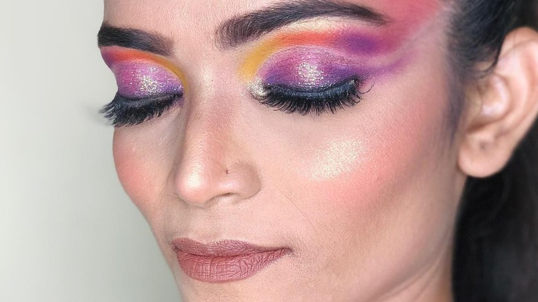 Woman with rainbow-inspired eyeshadow