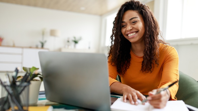 Woman studying at laptop