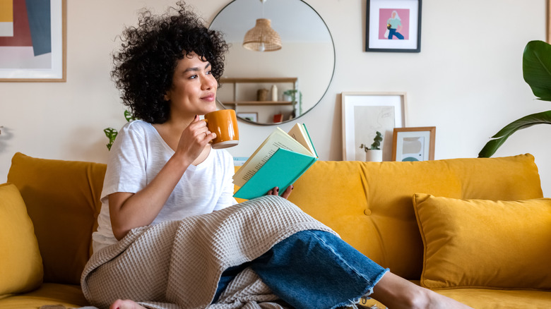 A woman relaxing with a book 