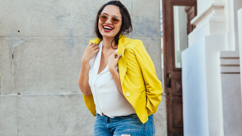 woman wearing a yellow blazer