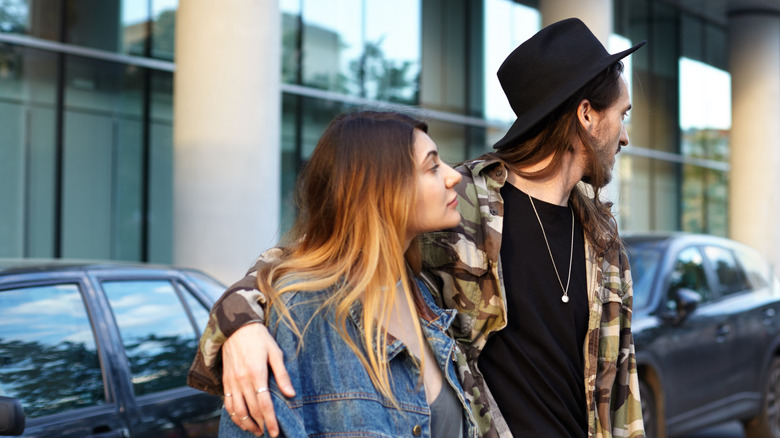 Pickup artist flirting with woman