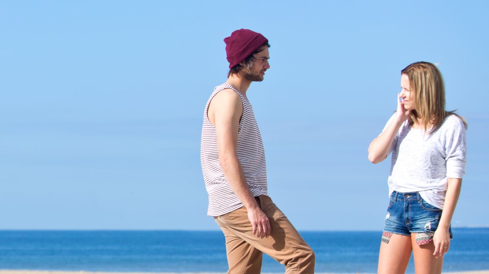 Pickup artist flirting with woman