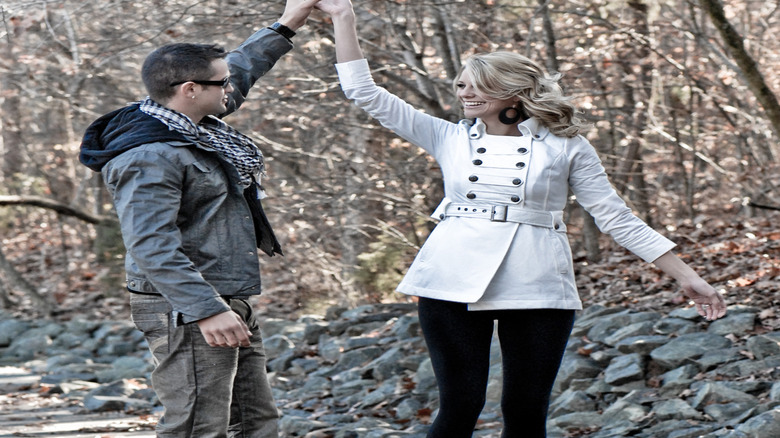 Pickup artist spinning woman