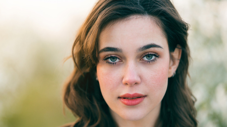 Woman with green-colored eyes