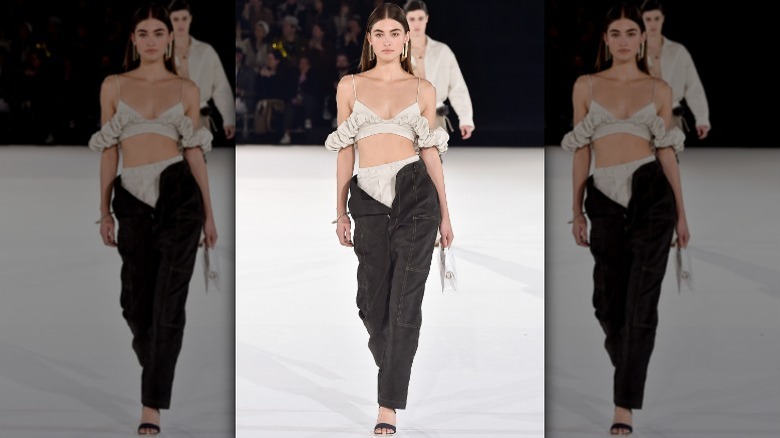 Jacquemus runway unbuttoned jeans trend
