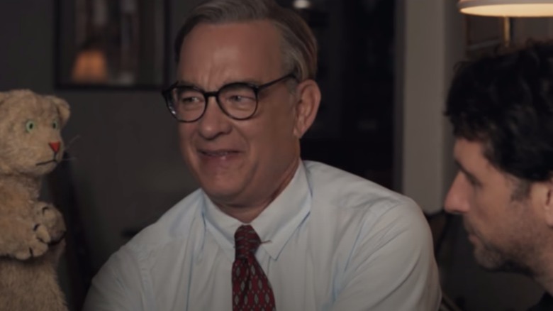 Tom Hanks as Mister Rogers with puppet 