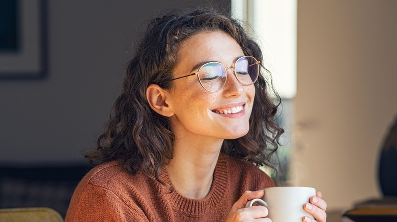 smiling woman in glasses 