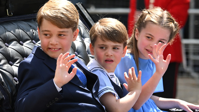 Prince George, Prince Louis, and Princess Charlotte waving