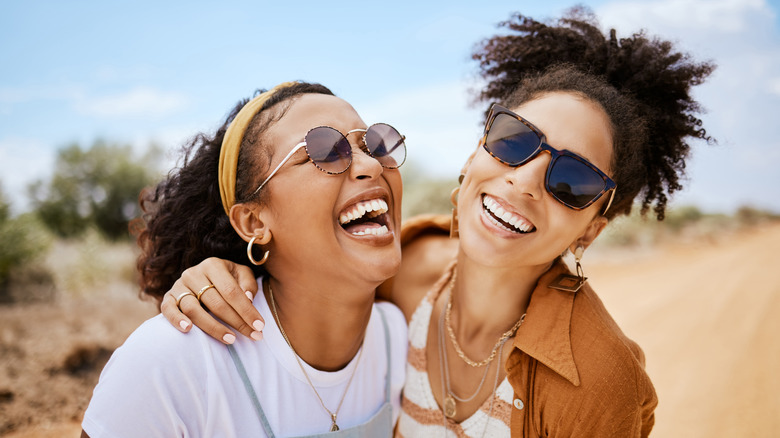 Two friends laughing