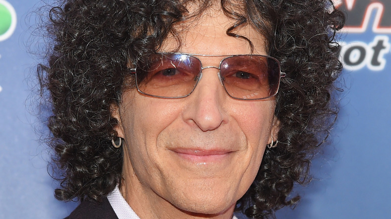 Howard Stern smiles