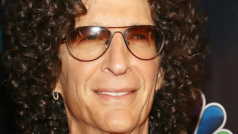 Howard Stern posing on the red carpet