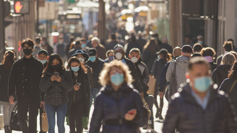 A crowd with masks on